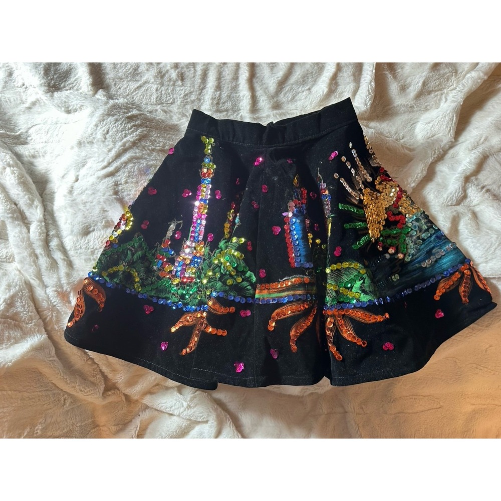 Black sequined mini skirBlack sequined mini skirt with tropical palm tree design